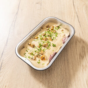 Beenham met champignonsaus